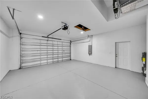 a view of a livingroom with a ceiling fan and window