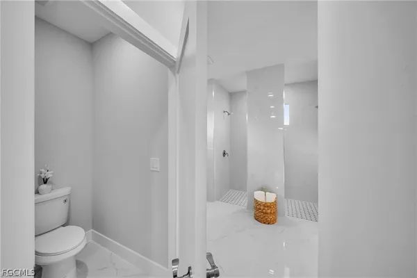 an aerial view of a house with a garden