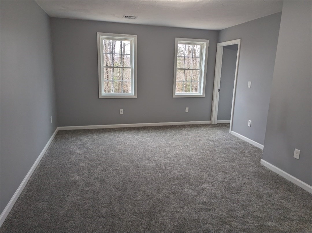 508 Old County Road Holland, MA 01521 - Photo 19 of 42 an empty room with windows