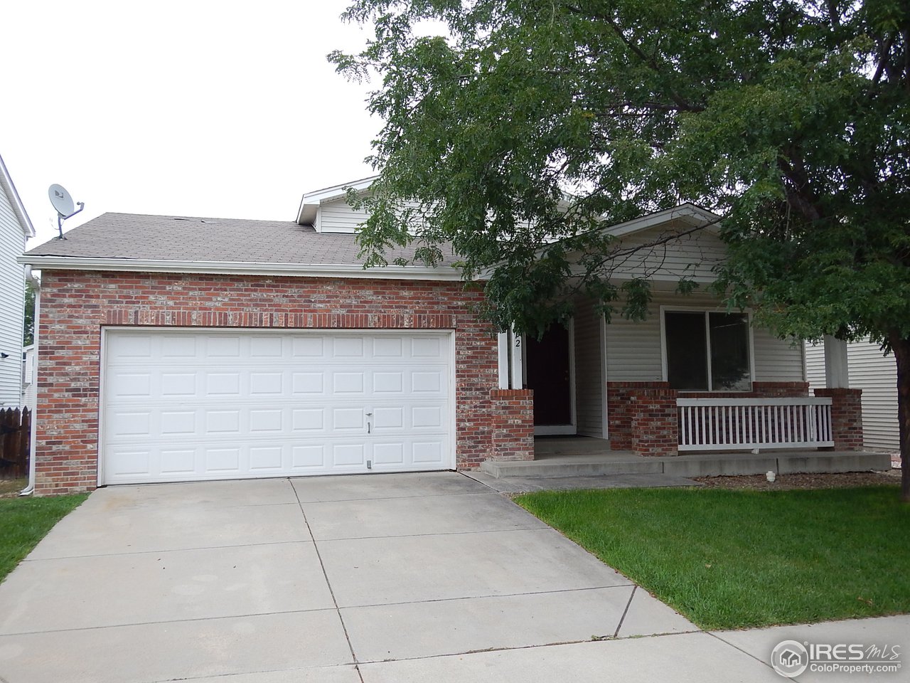 front view of house with a yard