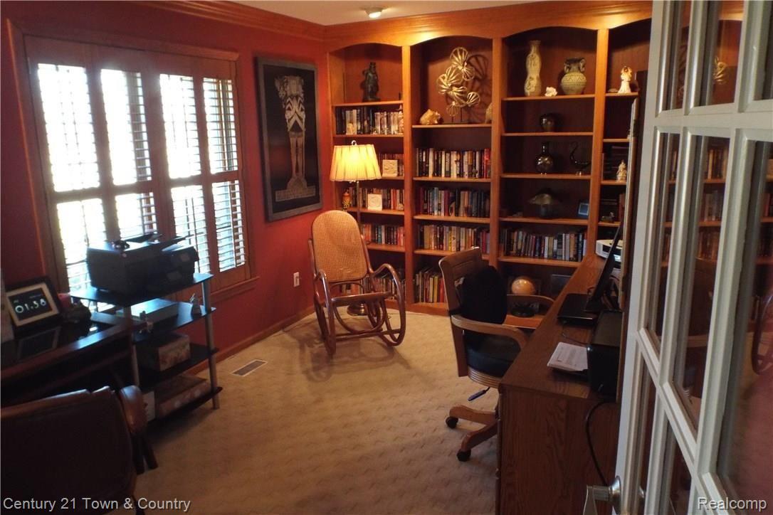 6384 Perry Road Grand Blanc, MI 48439 - Photo 8 of 77 Private office with french door and built in bookshelves.