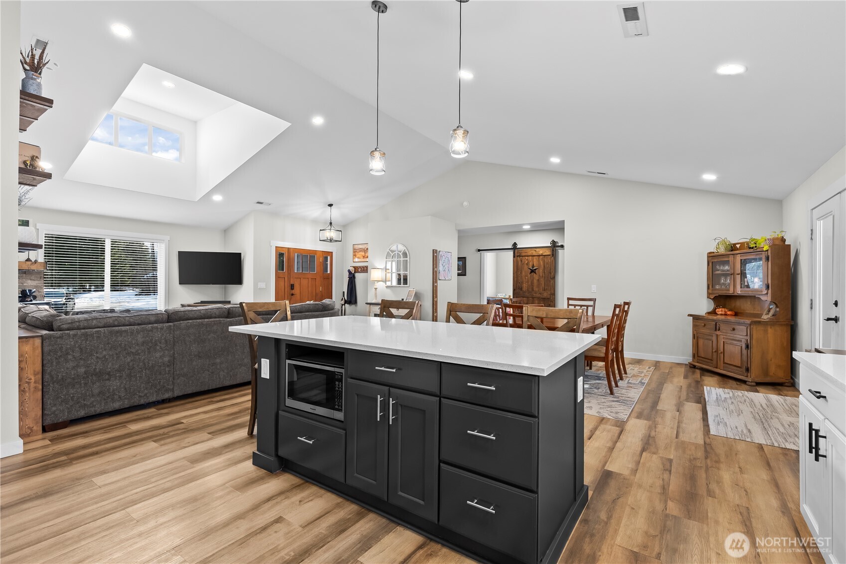 971 Old Cedars Road Cle Elum, WA 98922 - Photo 12 of 39 a kitchen with a counter top a sink stainless steel appliances and cabinets