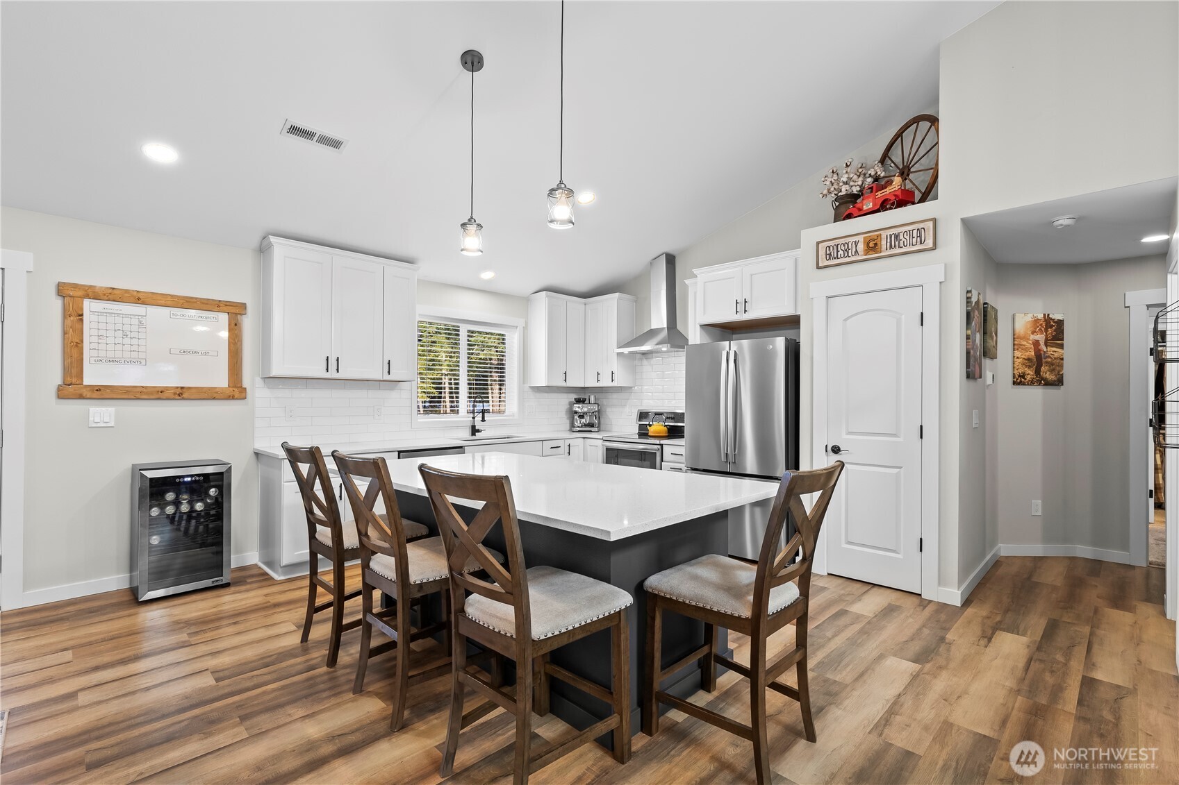 971 Old Cedars Road Cle Elum, WA 98922 - Photo 8 of 39 a view of a dining room with furniture and wooden floor