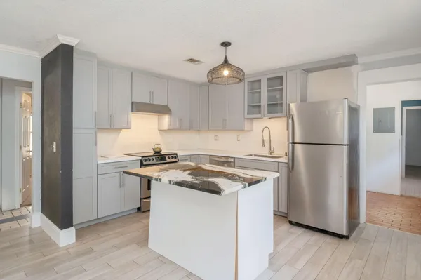 an empty room with a bathroom