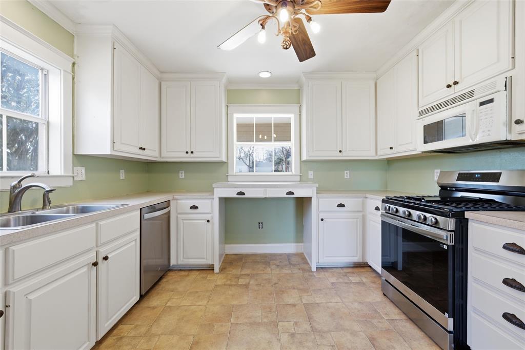 3005 Windsor Avenue Waco, TX 76708 - Photo 11 of 37 a kitchen with cabinets appliances and a window
