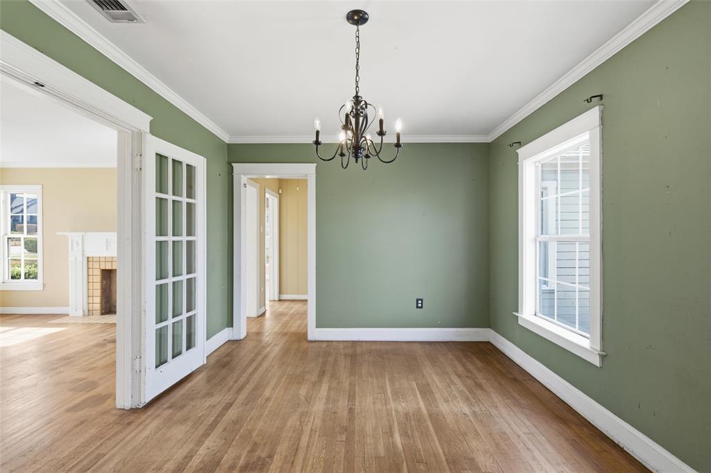 3005 Windsor Avenue Waco, TX 76708 - Photo 15 of 37 wooden floor in an empty room with a window