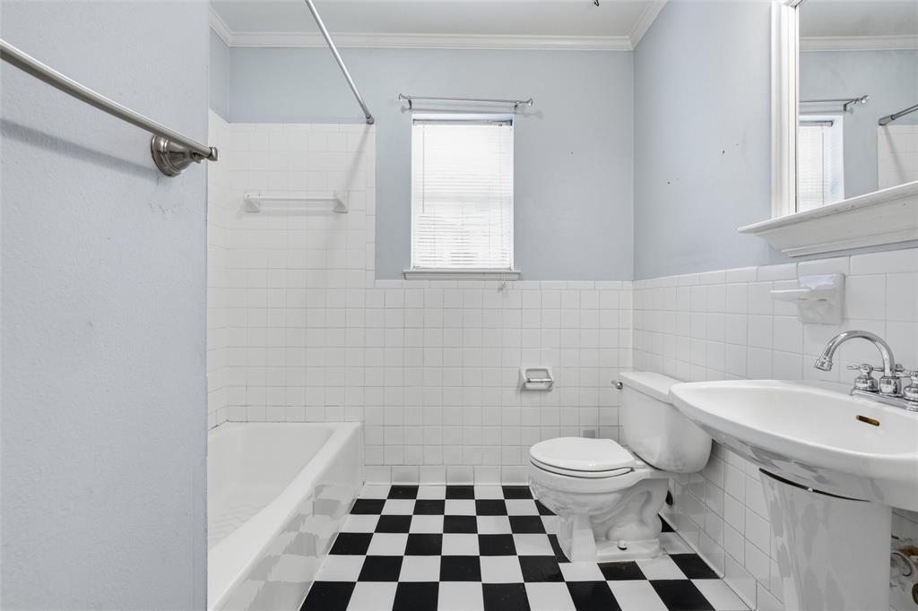 3005 Windsor Avenue Waco, TX 76708 - Photo 20 of 37 a white toilet sitting next to a white sink