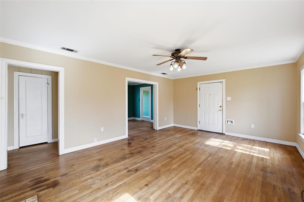 3005 Windsor Avenue Waco, TX 76708 - Photo 6 of 37 a view of an empty room with wooden floor