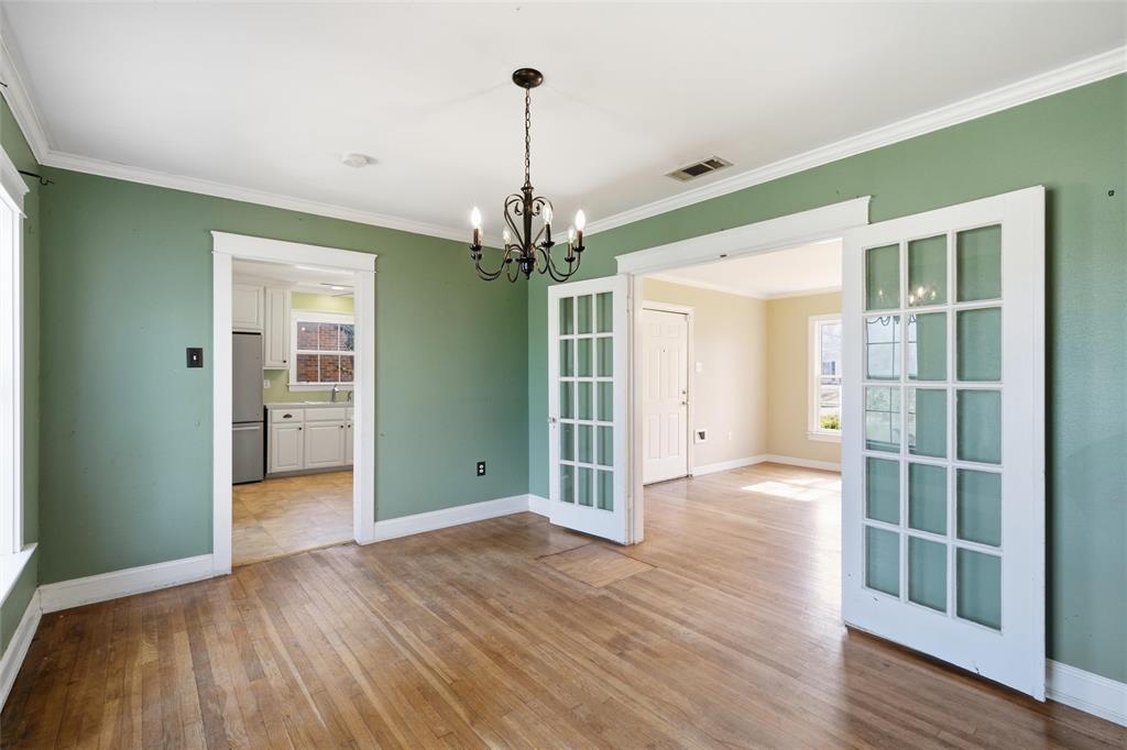 3005 Windsor Avenue Waco, TX 76708 - Photo 8 of 37 a view of a room with wooden floor and window
