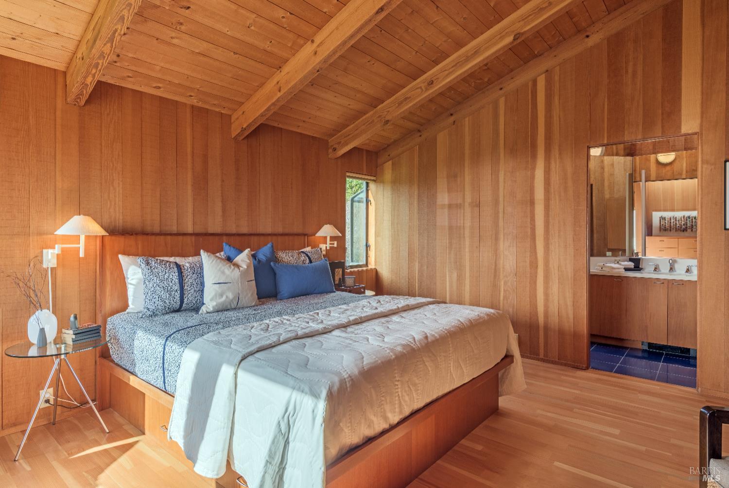336 Pipers Reach The Sea Ranch, CA 95497 - Photo 5 of 15 a bed sitting in a spacious bedroom next to a window
