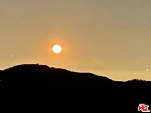 a storage and utility room with washer and dryer