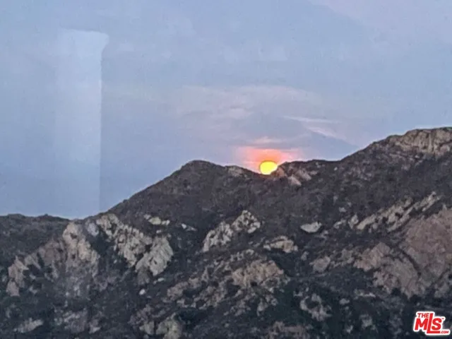 a view of a back yard of the house