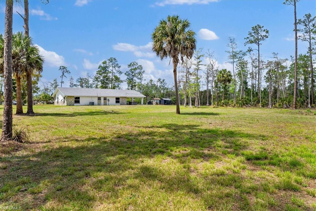 6070 Lee Williams Road Naples, FL 34117 - Photo 26 of 26 a view of a volley ball court