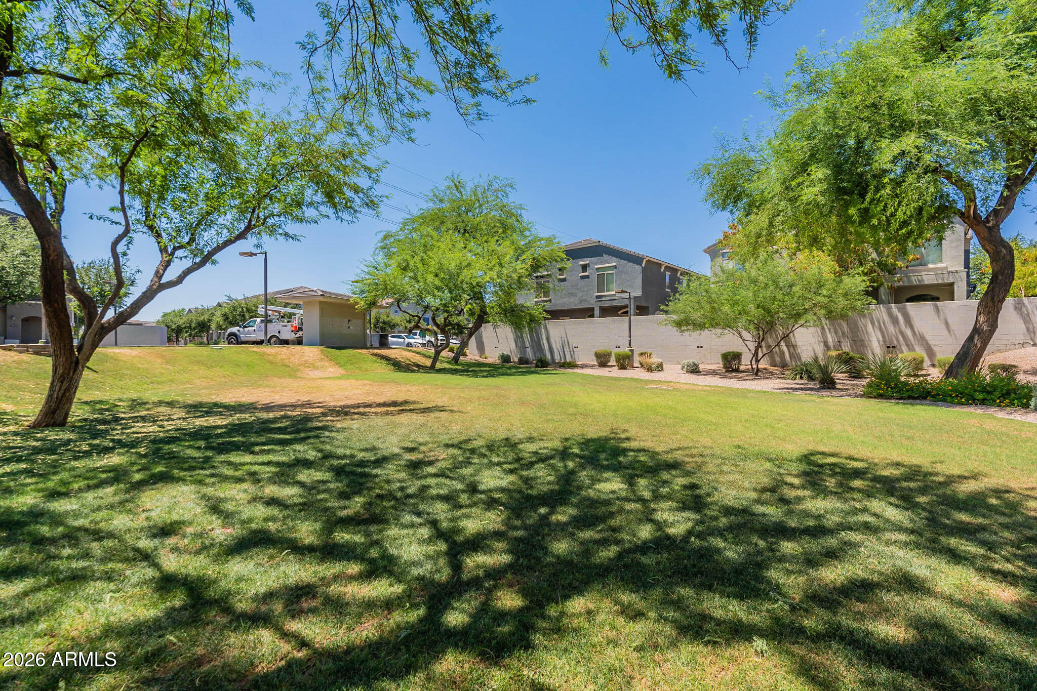 2402 East 5th Street, Unit 1409 Tempe, AZ 85288 - Photo 31 of 34 a view of a house with a yard