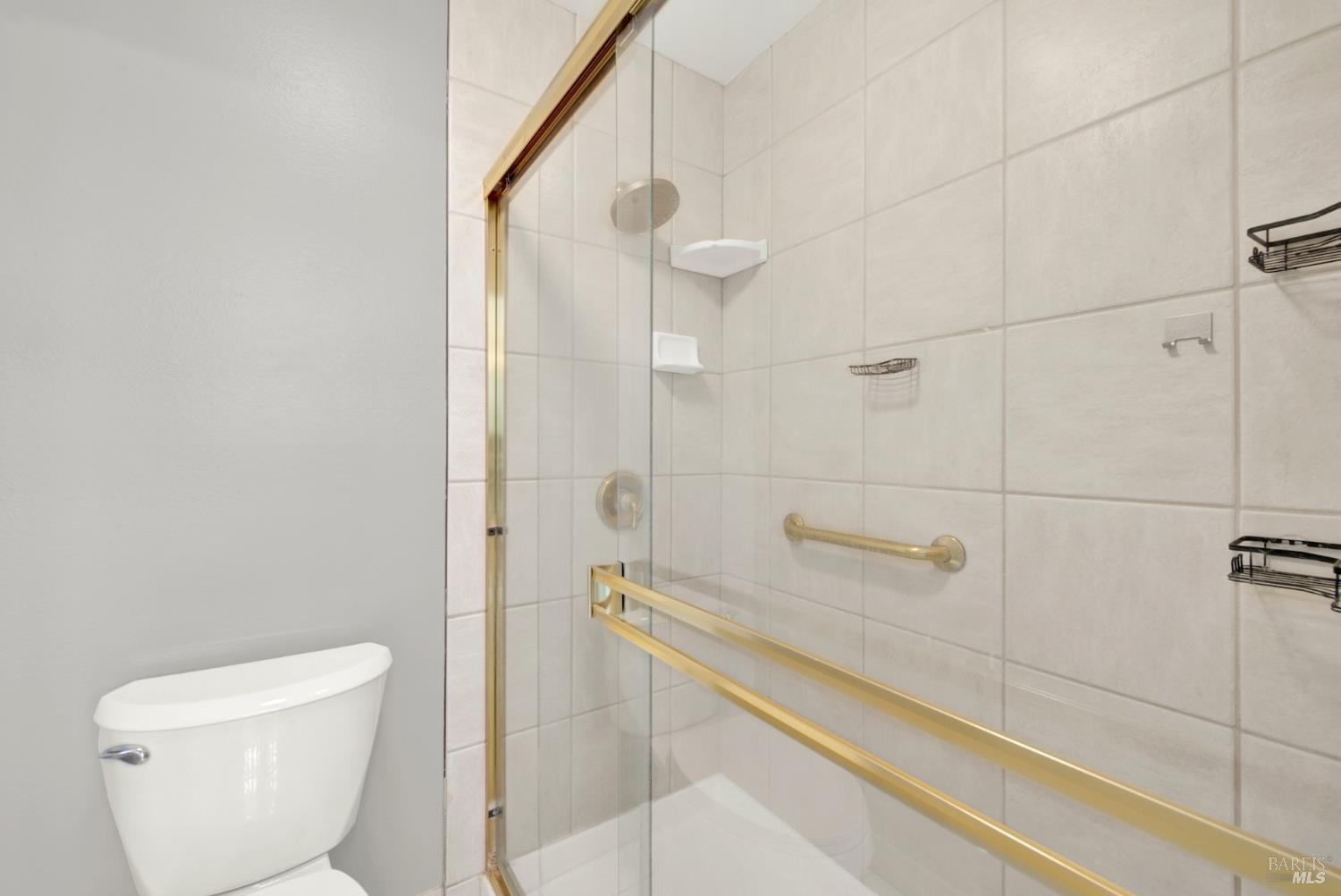 1270 Willow Lake Road Discovery Bay, CA 94505 - Photo 27 of 29 a bathroom with a toilet and shower