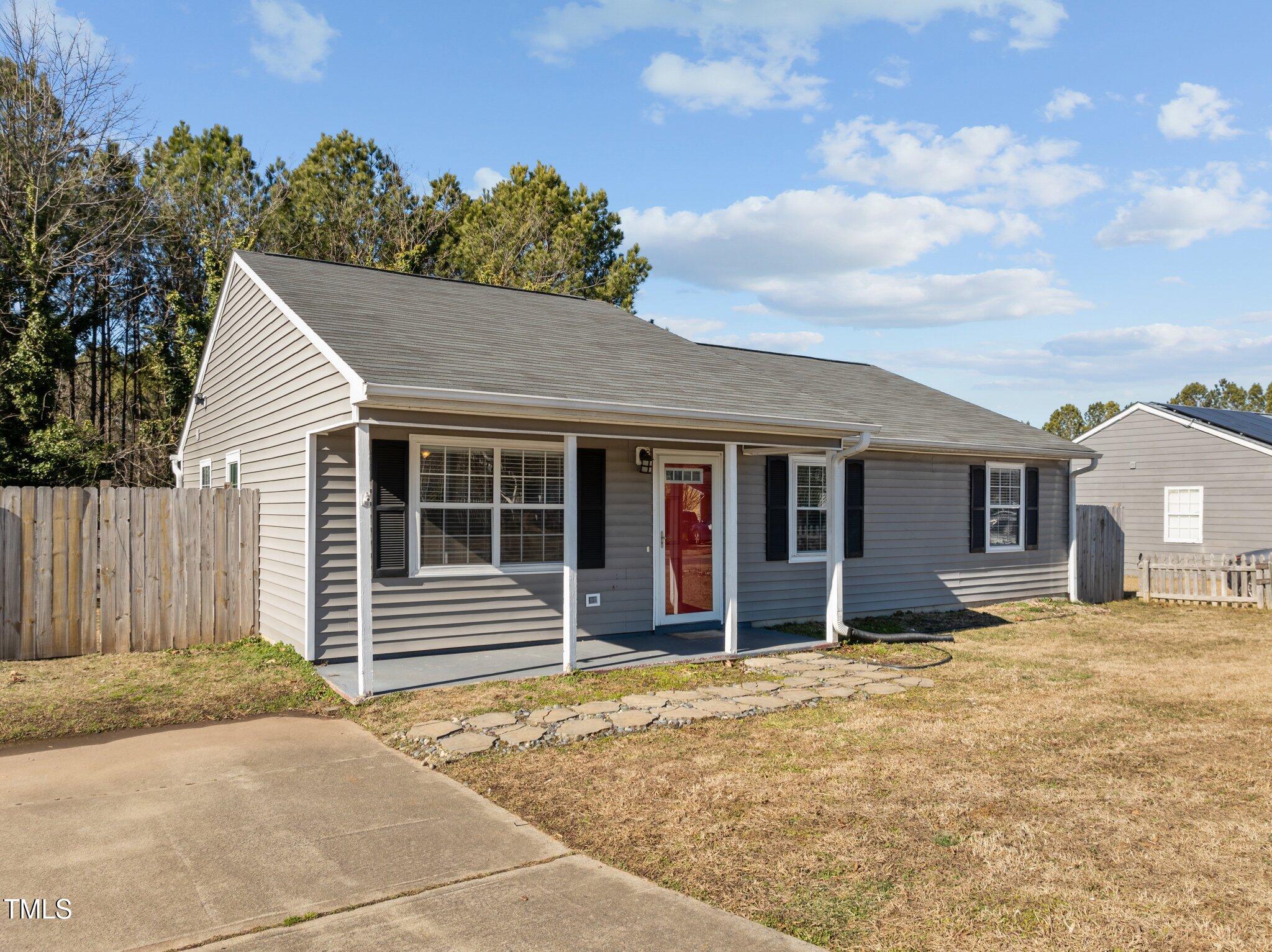 4104 Ludgate Drive Durham, NC 27713 - Photo 2 of 46 a house with yard in front of it