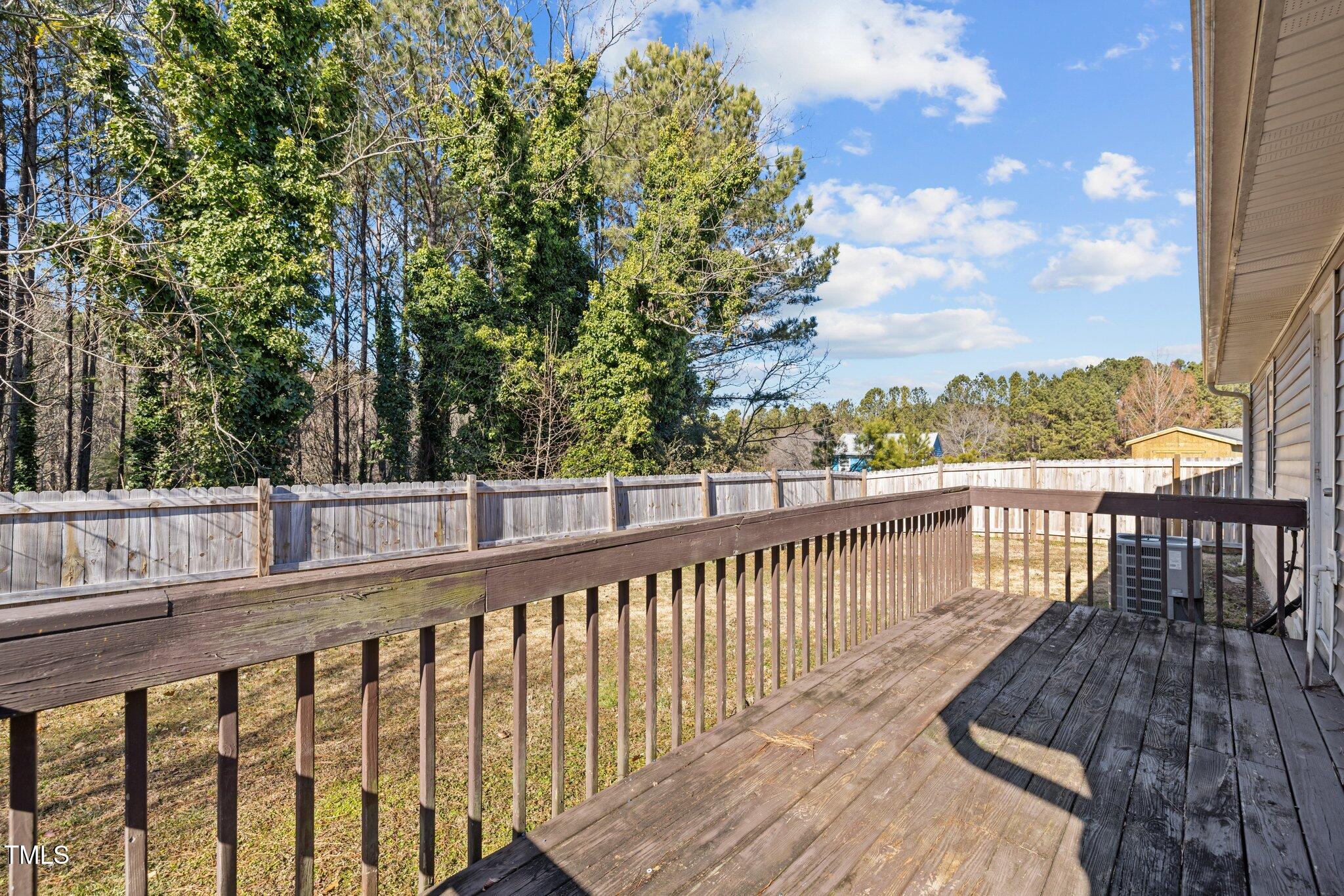 4104 Ludgate Drive Durham, NC 27713 - Photo 36 of 46 a view of a balcony with wooden floor