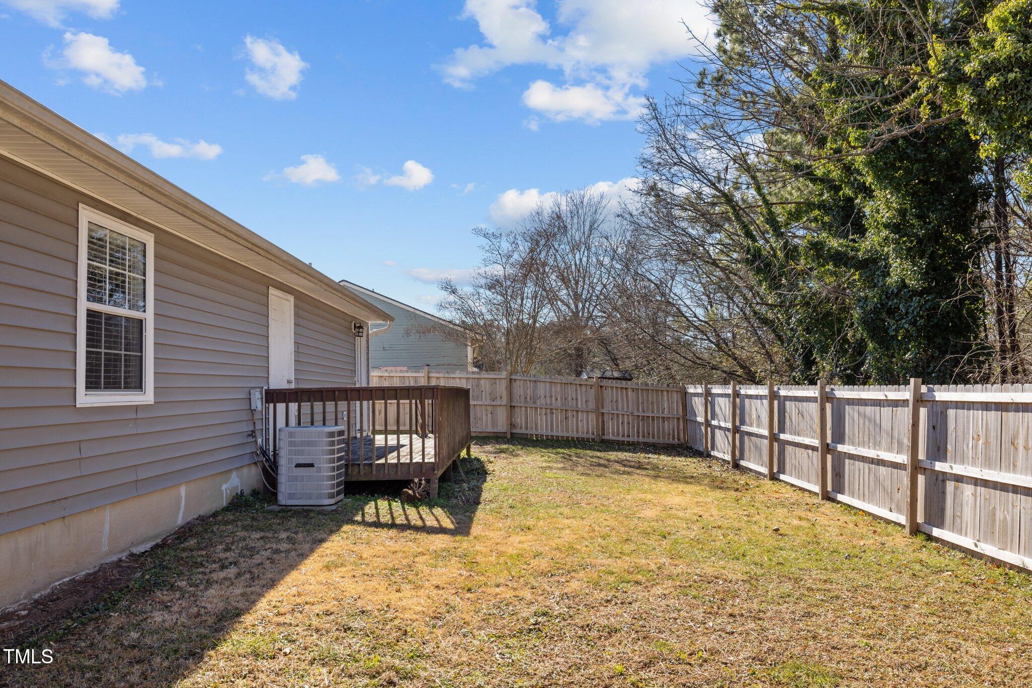 4104 Ludgate Drive Durham, NC 27713 - Photo 38 of 46 a view of a house with backyard and sitting area