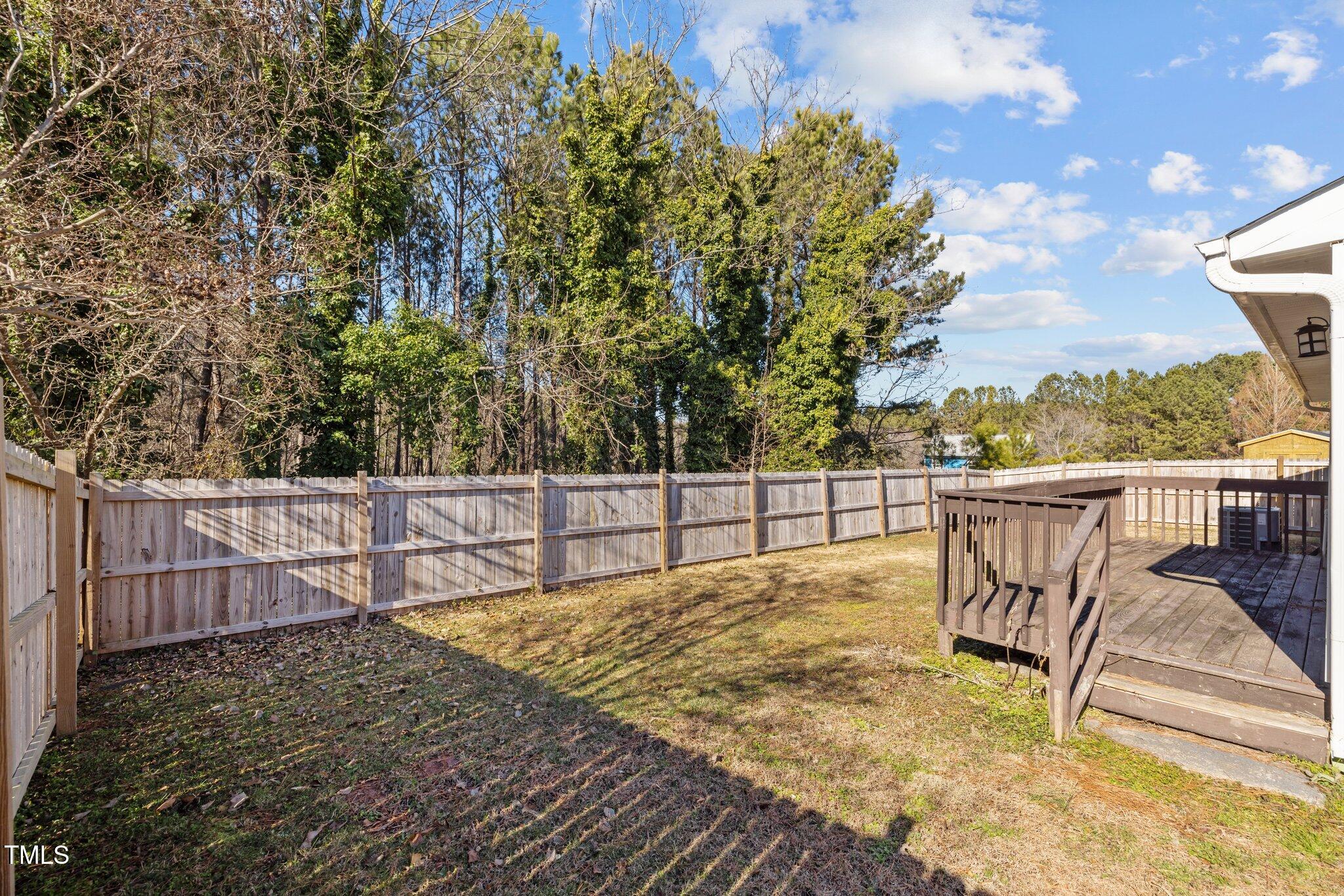 4104 Ludgate Drive Durham, NC 27713 - Photo 39 of 46 a view of a chair and table on the wooden floor