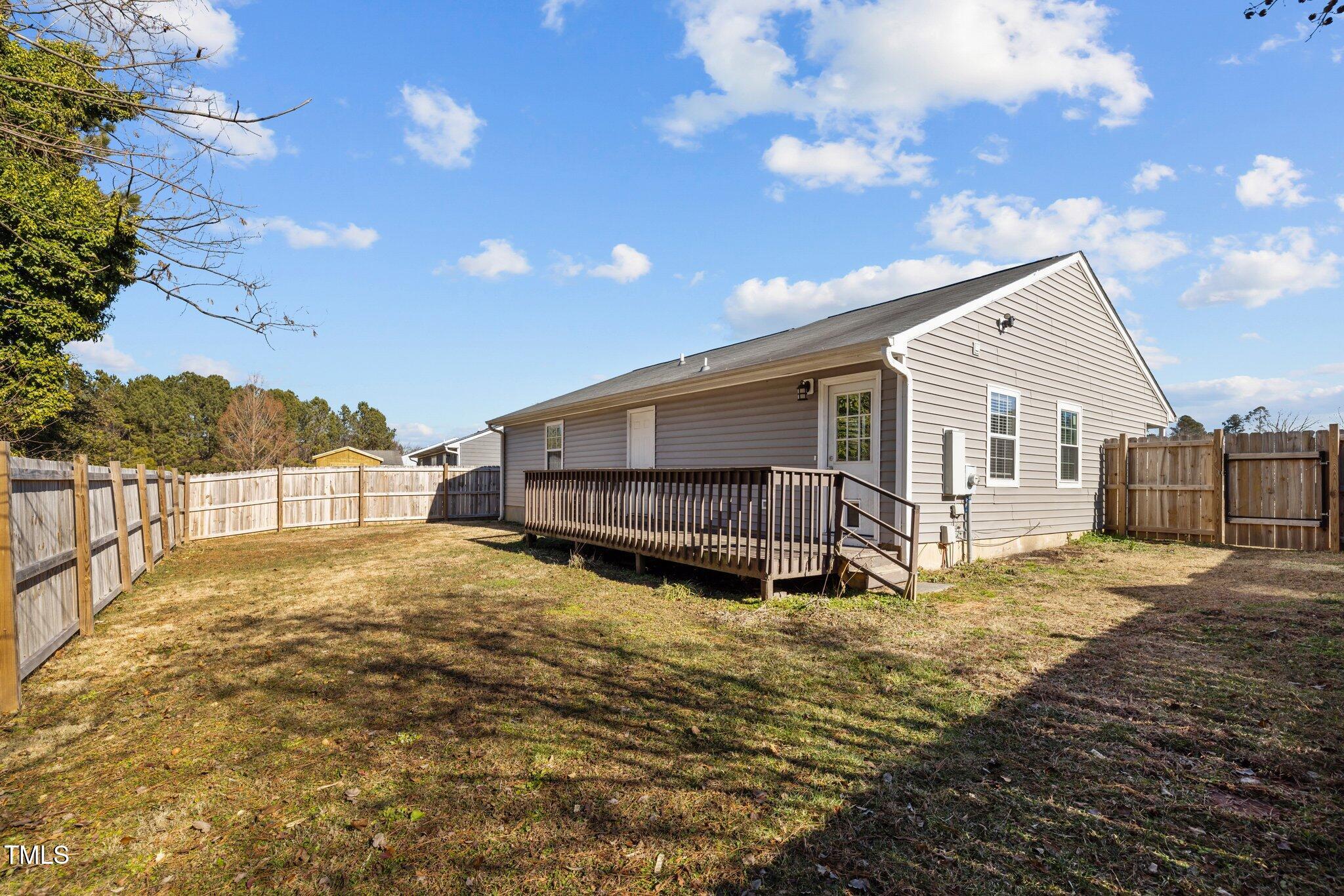 4104 Ludgate Drive Durham, NC 27713 - Photo 40 of 46 a view of a house with a yard and sitting area