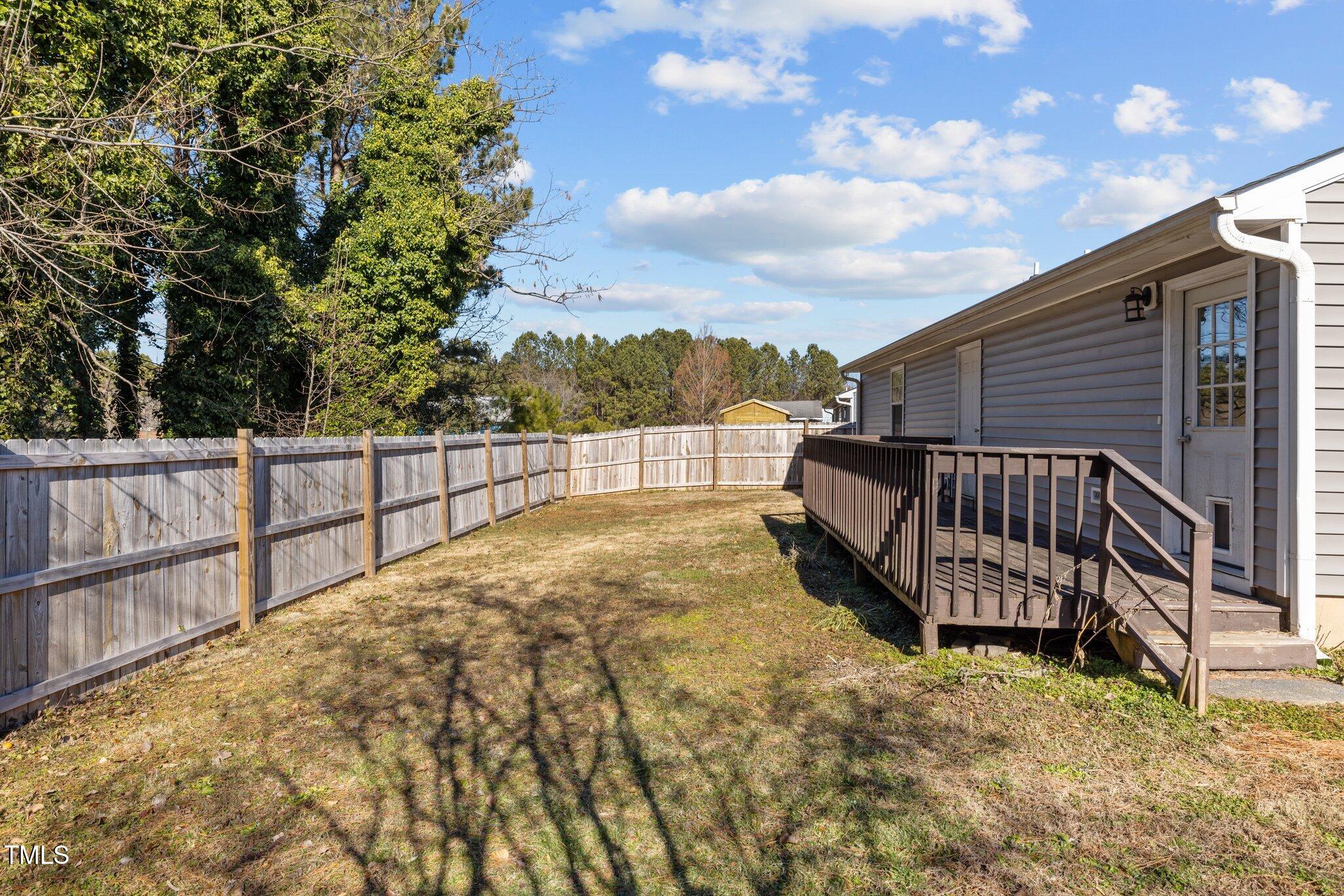 4104 Ludgate Drive Durham, NC 27713 - Photo 41 of 46 a view of backyard with cabin