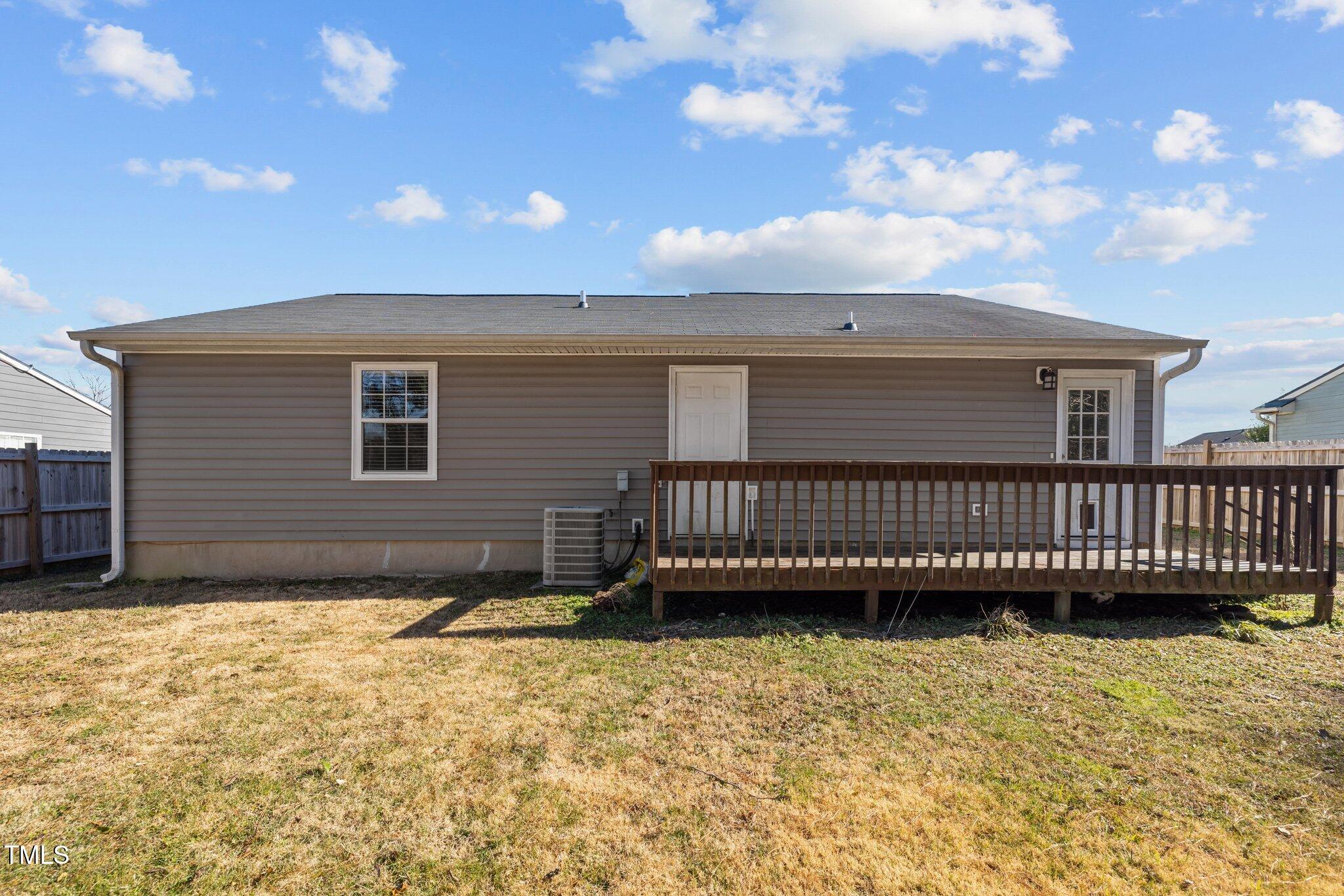4104 Ludgate Drive Durham, NC 27713 - Photo 42 of 46 a view of a house with a roof deck