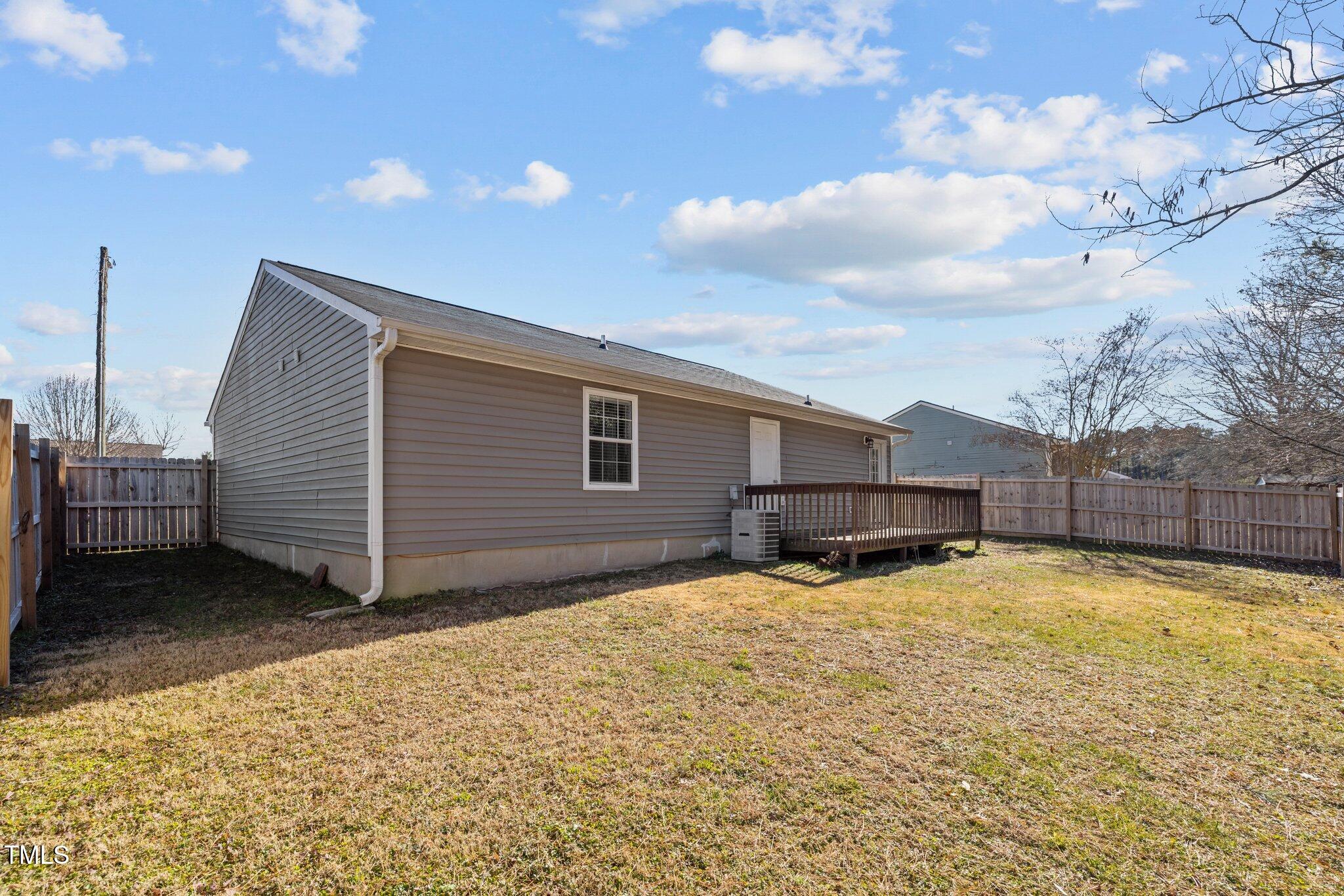 4104 Ludgate Drive Durham, NC 27713 - Photo 43 of 46 a view of a house with a backyard