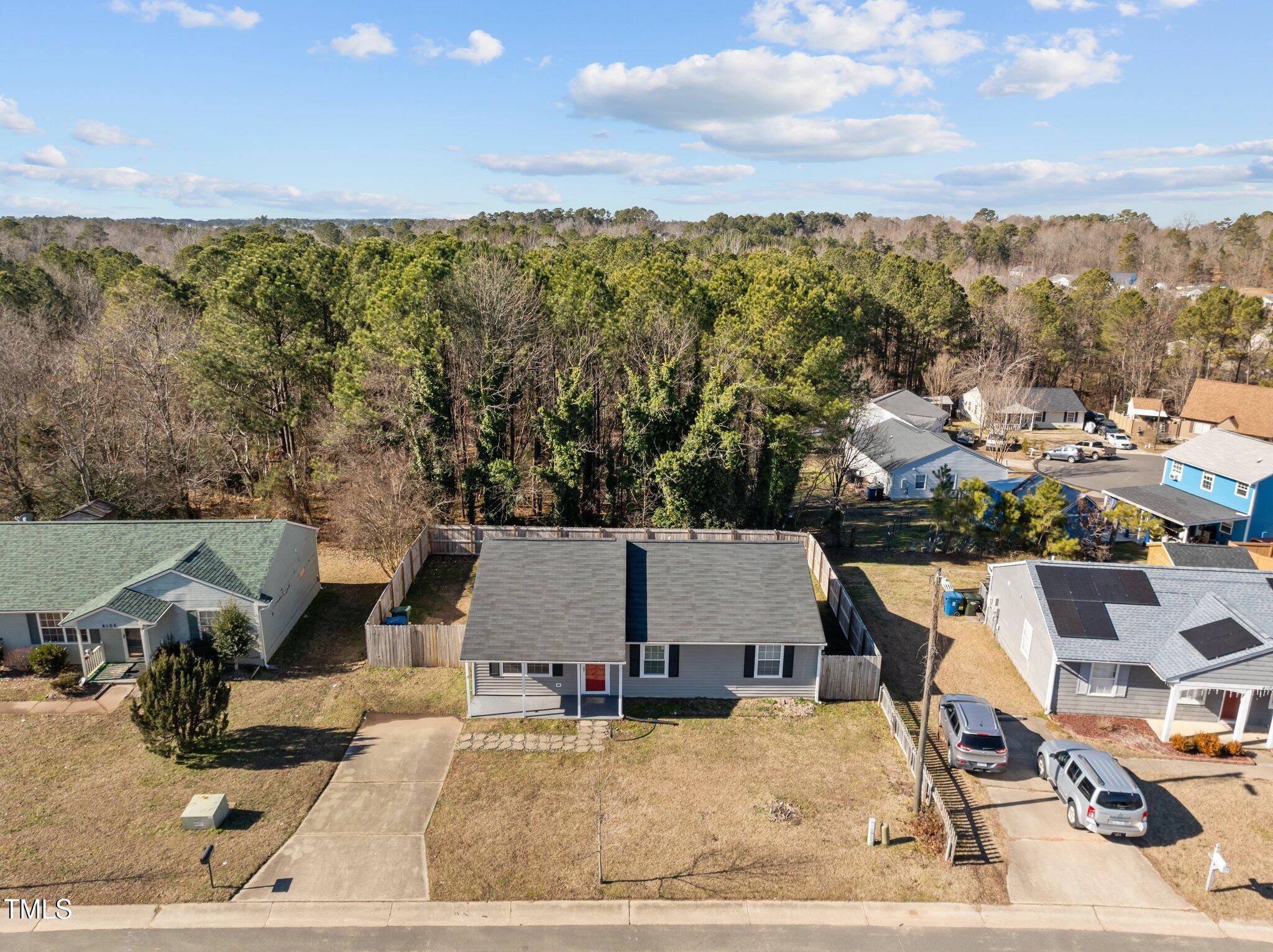 4104 Ludgate Drive Durham, NC 27713 - Photo 45 of 46 an aerial view of a house with a yard basket ball court and outdoor seating