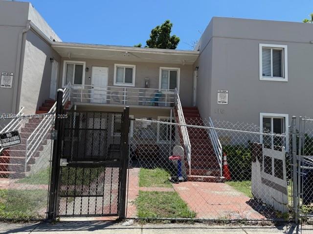 172 Northwest 12th Street, Unit 2 Miami, FL 33136 - Photo 1 of 11 a view of front door of house