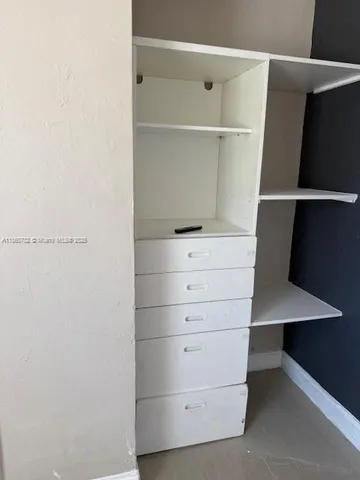 a front view of a house with a garage