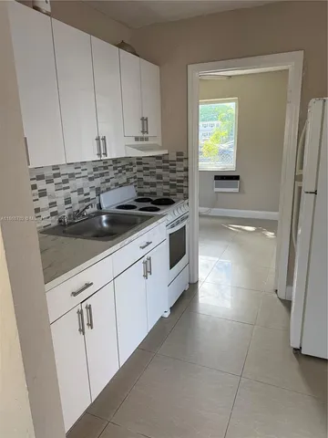 a bathroom with a shower and a toilet