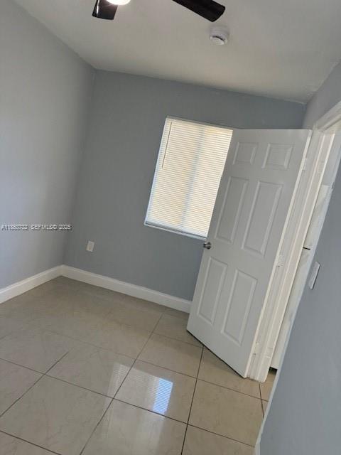 172 Northwest 12th Street, Unit 2 Miami, FL 33136 - Photo 8 of 11 a view of an empty room with a window
