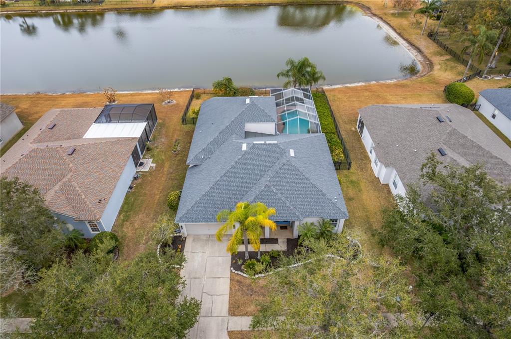19015 Fern Meadow Loop Lutz, FL 33558 - Photo 50 of 50 an aerial view of a house with a swimming pool
