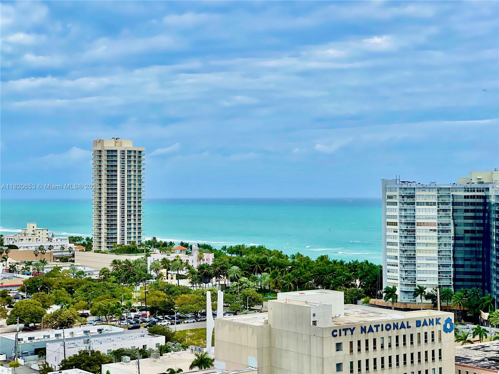 401 69th Street, Unit 405 Miami Beach, FL 33141 - Photo 21 of 25 a view of a city with tall buildings