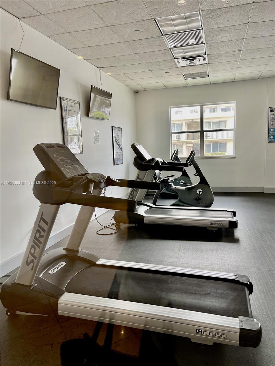 401 69th Street, Unit 405 Miami Beach, FL 33141 - Photo 24 of 25 a living room with furniture