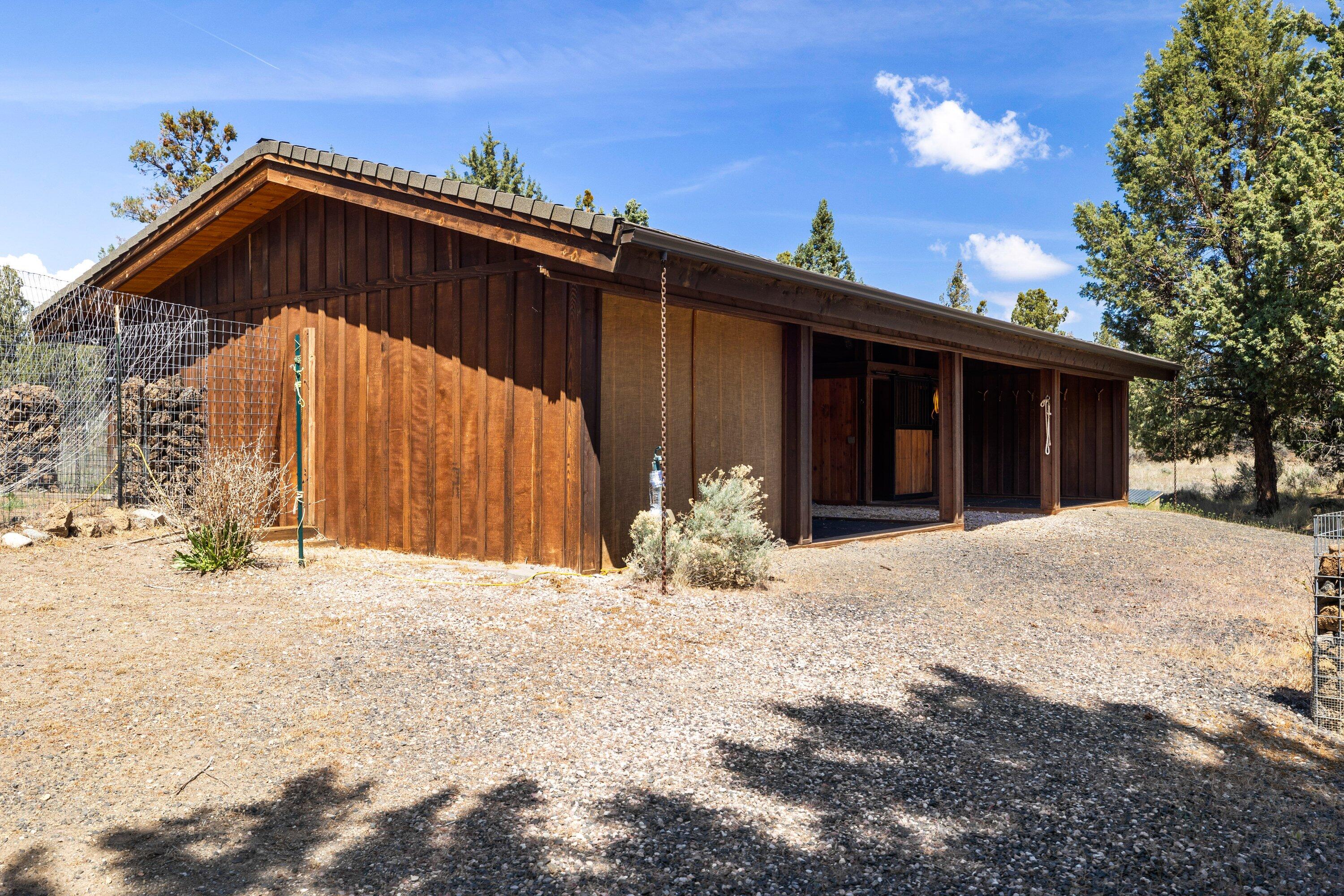 64155 Hunnell Road Bend, OR 97703 - Photo 67 of 92 Fabulous two-stall barn with tack room.