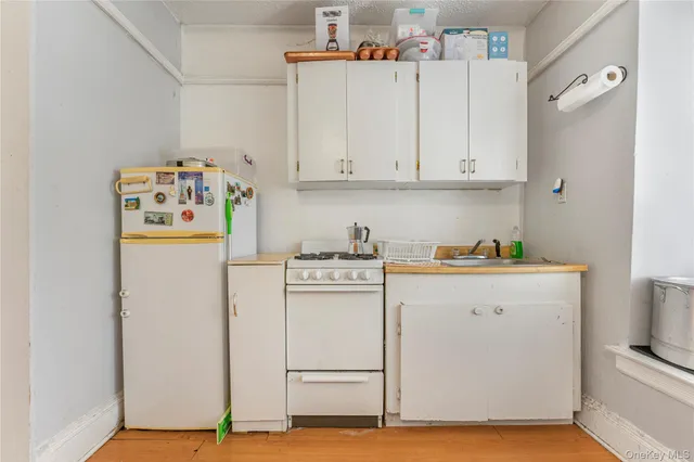 $699,999 | 85-06 122nd Street | Kew Gardens