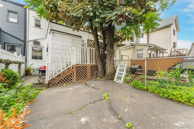 $699,999 | 85-06 122nd Street | Kew Gardens