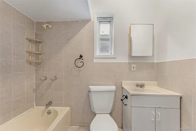 $699,999 | 85-06 122nd Street | Kew Gardens