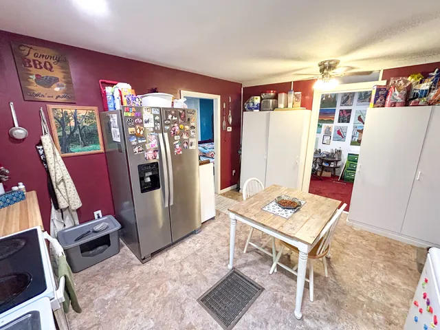 a front view of a workspace with furniture and toys