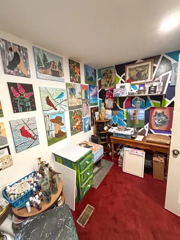 a kitchen with stainless steel appliances granite countertop a stove a sink dishwasher and a refrigerator