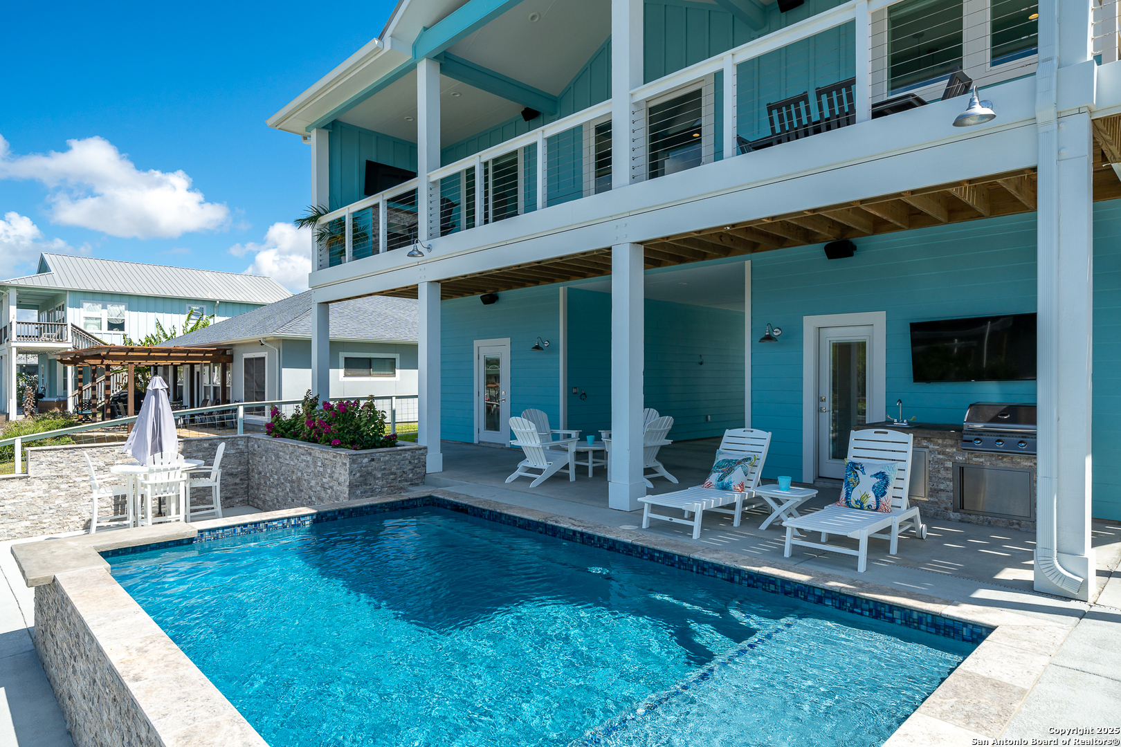 107 Windjammer Road Rockport, TX 78382 - Photo 2 of 52 a view of pool with outdoor seating