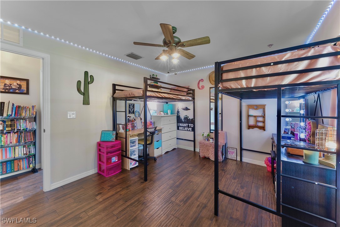 7583 18th Place LaBelle, FL 33935 - Photo 24 of 36 a view of a livingroom with furniture and hardwood floor