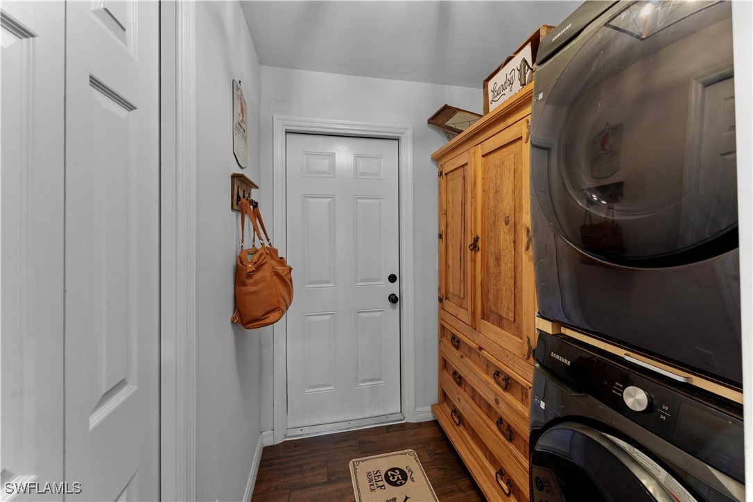 7583 18th Place LaBelle, FL 33935 - Photo 25 of 36 a bathroom with a shower and mirror