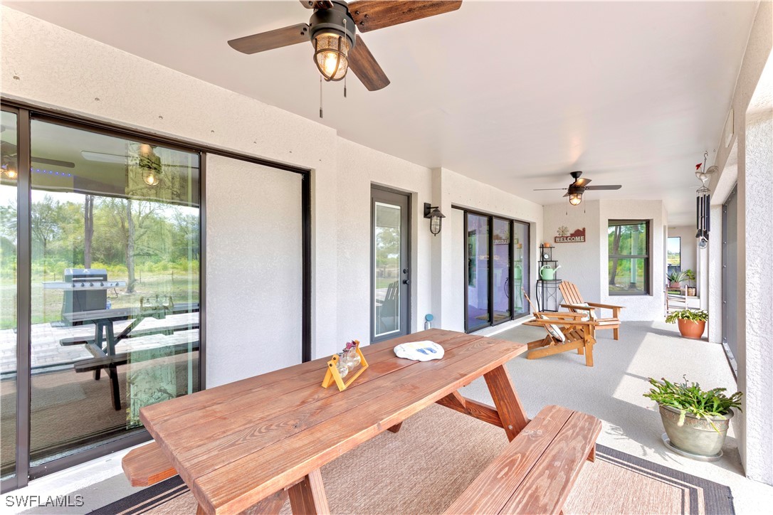 7583 18th Place LaBelle, FL 33935 - Photo 26 of 36 a view of a dining room with furniture window and outside view
