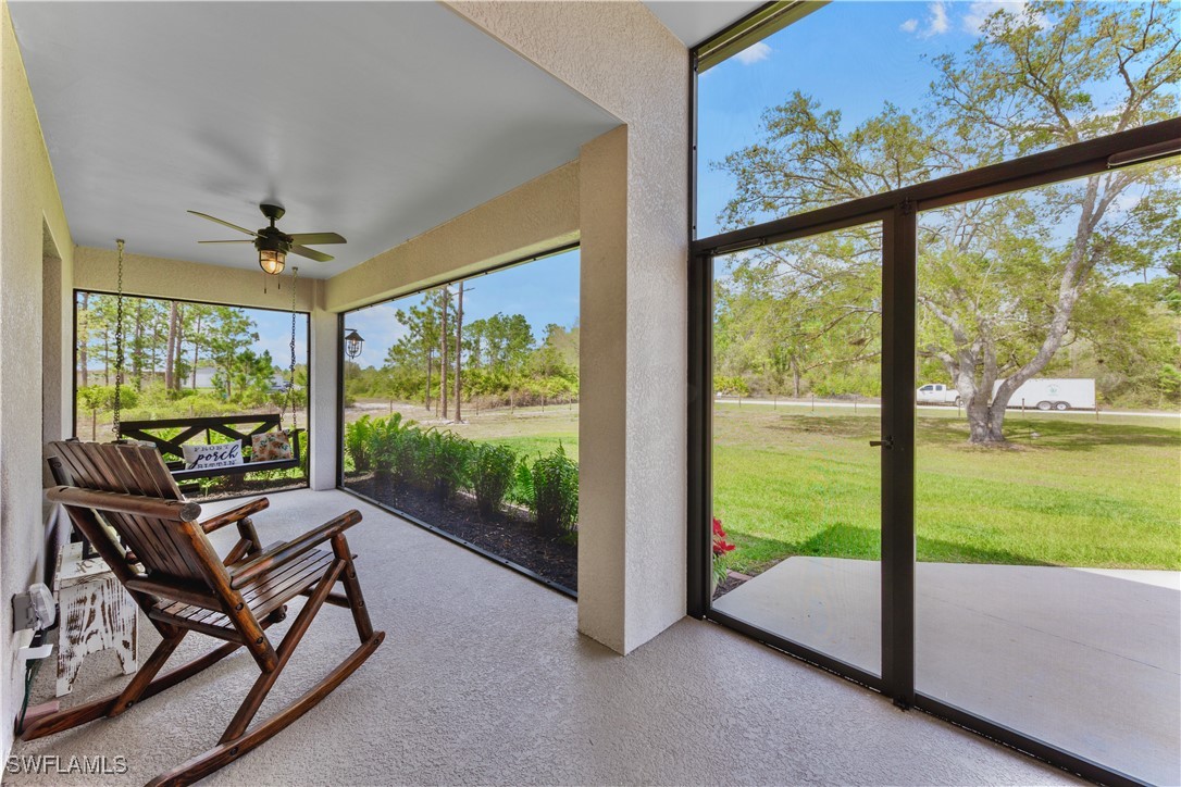 7583 18th Place LaBelle, FL 33935 - Photo 7 of 36 a living room with hardwood floor and garden view