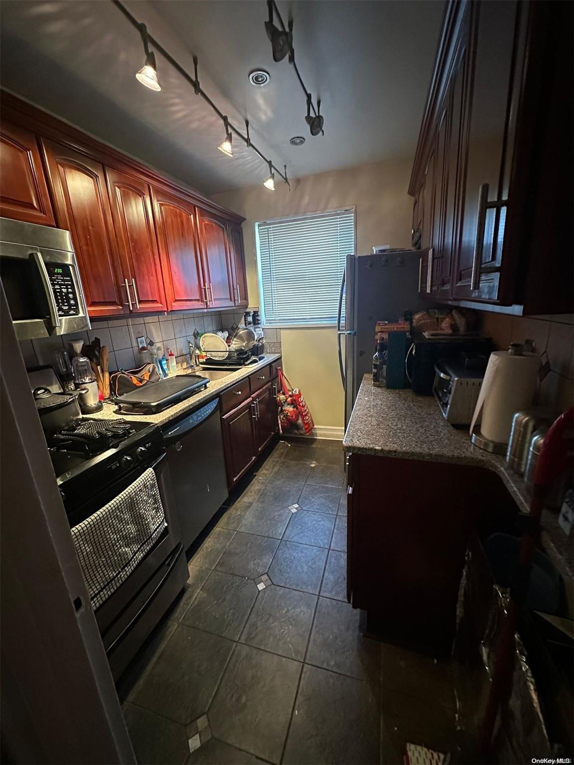 136-17 68th Drive, Unit A Queens, NY 11367 - Photo 3 of 6