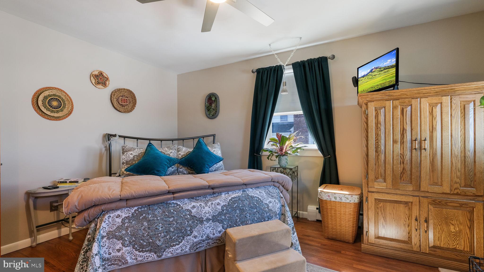 7078 Easton Road Pipersville, PA 18947 - Photo 18 of 45 a bedroom with a bed and a window