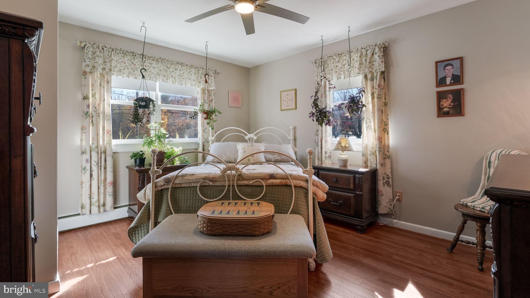 7078 Easton Road Pipersville, PA 18947 - Photo 22 of 45 a living room with furniture and a chandelier