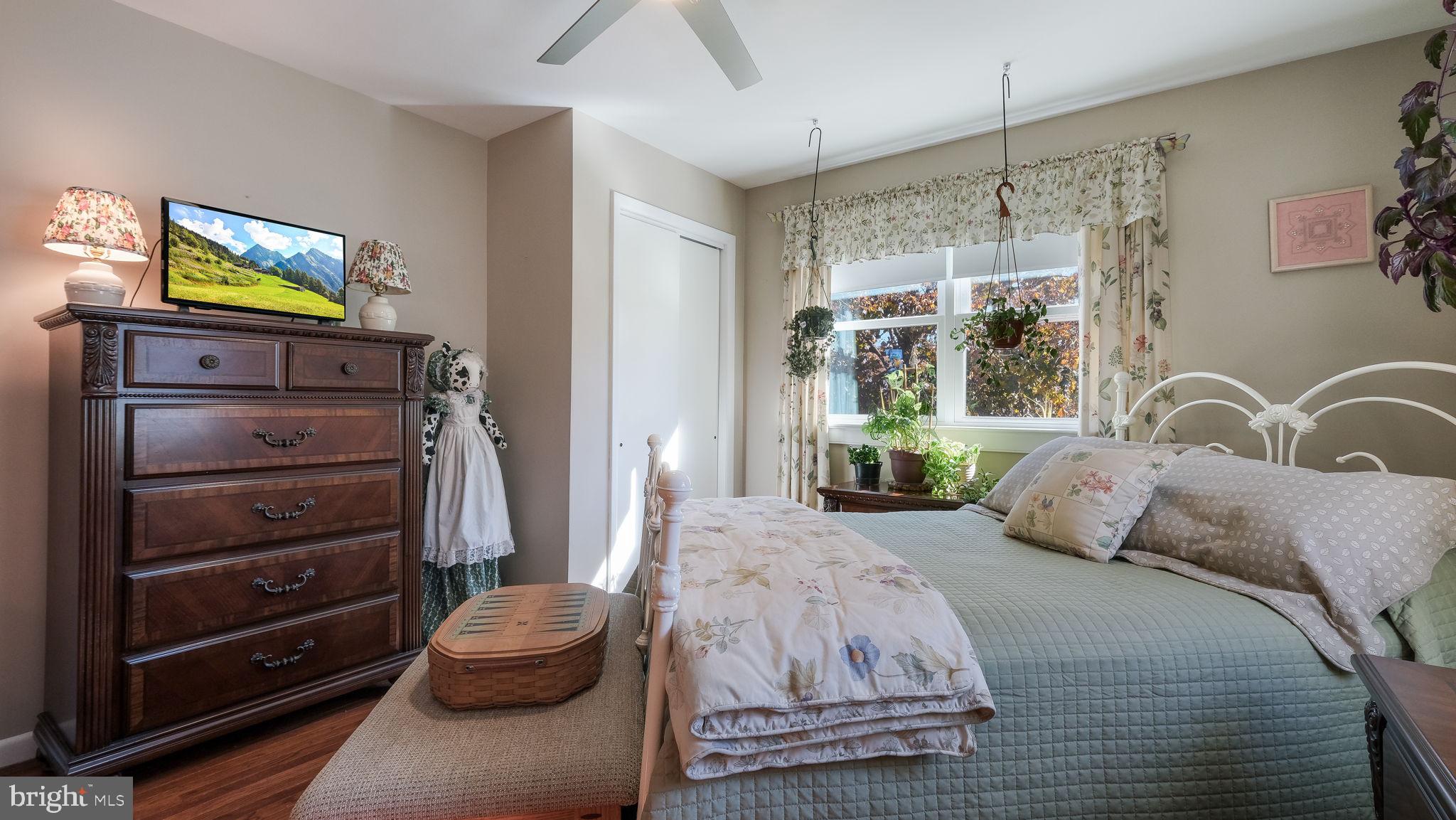 7078 Easton Road Pipersville, PA 18947 - Photo 23 of 45 a bedroom with a bed and a tv